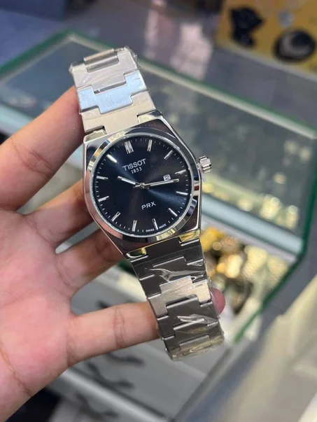 TISSOT Pour Homme